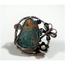 Silver and brass ring embellished with a butterfly and a large turquoise