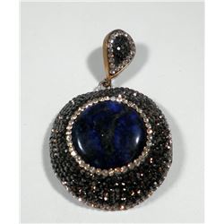 Big round silver and brass pendant set with central lapis setting