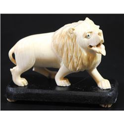 Roaring lion, old European ivory carving