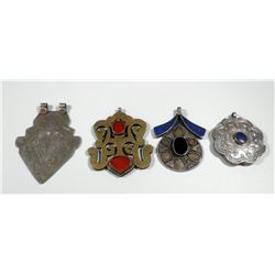 Collection of 4 (low) silver Turkmen pendants