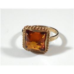 K9 gold ring with amber setting