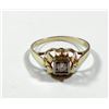 Image 1 : K14 gold ring set with an old faceted central diamond