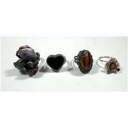 Collection of 4 silver vintage rings