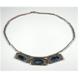 Sterling silver link necklace and part of a pendant set with metalic-color glass