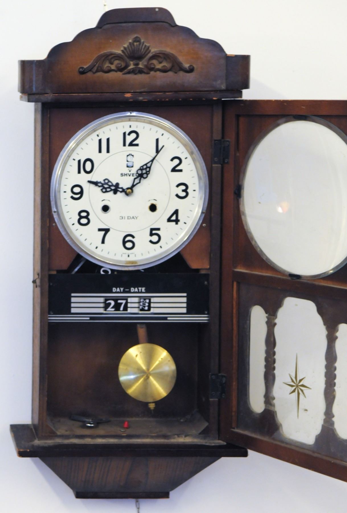 Wall Mounted Pendulum Clock By Shved Wall Mounted Pendulum Clock By Shved