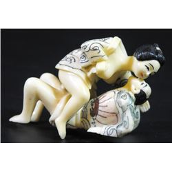 Couple in an erotic position, pair of statuettes of a man and woman