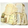 Image 1 : Box with a collection of bills, receipts and documents, most of them related to revenue stamps