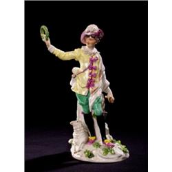 Porzellanfigur. Schäfer. Auf naturalistischem Sockel stehende Figur, zu seinen Füssen ruhendes Sc...