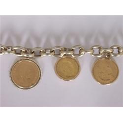 Gliederarmband. 14 Karat G G. Eingehängte Goldmünzen. Gew. ca. 50 G. 720,00 €...