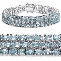STERLING SILVER BLUE TOPAZ TRIPLE ROW BRACELET