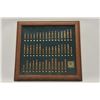 18BG-19 TATONKA CART. BULLET BOARDFramed Tatonka cartridge Co. bullet board  displaying cartridges f