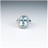 Image 2 : 18CAI-5 AQUAMARINE & DIAMOND RINGCaptivating Princess Diana style ring  featuring an oval blue Aquam