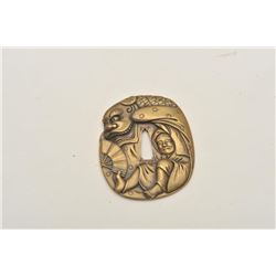 18CF-11 TSUBA BRASSFine and ornate Tsuba (Japanese sword guard)  brass alloy in ornate scene of man,