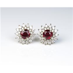 18CAI-15 RUBY EARRINGSExceptional pigeon blood Ruby earrings  featuring two matching round natural N