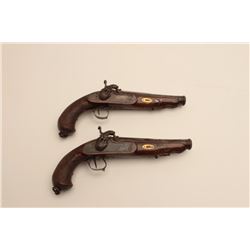 18AR-30 PAIR OF SPANISH PERC.Pair of ornate Spanish officer’s style  percussion pistols signed in si