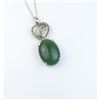 Image 3 : 18CAI-52 JADEITE/JADE PENDANTElegant pendant featured a green Jadeite/  Jade weighing 14.30 carats a