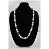 Image 1 : 18PRS-7 PEARLSOne very fine opera length(36 inches) strand  of black and   white baroque pearls  app