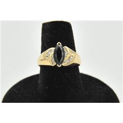 18RPS-19 SAPPHIRE & DIAMOND RINGOne ladies ring in 14k yellow gold set with a  marquee sapphire appr
