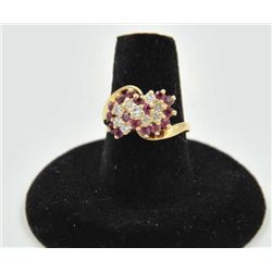 18RPS-20 RUBY & DIAMOND RINGOne ladies ruby and diamond cluster ring made  in 14k yellow gold EST:$3