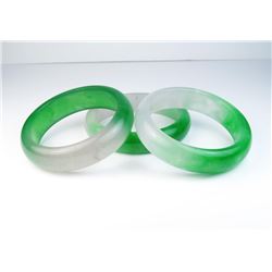 18CAI-56 3 BANGLE BRACELETSLot of three Green and Lavender Jade bangle  bracelets. Estimates $300-$7