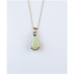 18CAI-41 OPAL & DIAMOND PENDANTElegant Australian Opal and Diamond pendant  in 14 karat yellow gold 