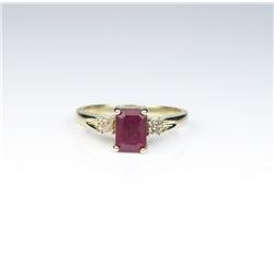 18CAI-47 RUBY RINGClassic Red Ruby ring weighing over 1.00  carat and accented two side Diamonds.  E