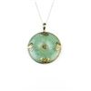 Image 1 : 158CAI-53 JADE/JADEITE DISCVery elegant green Jade/Jadeite disc in 14  karat yellow gold on a 10 kar