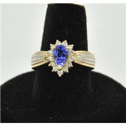 18RPS-23 TANZANITE RINGOne pear shaped tanzanite weighing approx 1ct  set in a 14k yellow gold tradi