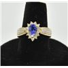 Image 1 : 18RPS-23 TANZANITE RINGOne pear shaped tanzanite weighing approx 1ct  set in a 14k yellow gold tradi