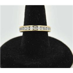18RPS-35 DIAMOND RINGOne 12 diamond weighing approx. 0.75ct  channel set in a 14k yellow gold band  