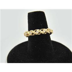 18RPS-29 GOLD WIRE KNOT BANDOne unique gold wire knot band set with  diamonds, 12 diamonds approx et