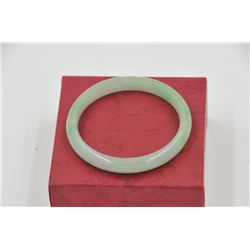 18RPS-39  JADE BANGLE BRACELETOne fine green jade bangle bracelet  EST:$150-300