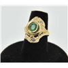 Image 1 : 18RPS-25 EMERALD & DIAMOND RINGOne free form floral designed ring set with  an oval emerald and diam