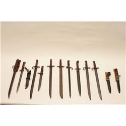 17MH-82 BAYONET LOTLot of 13 misc. military bayonets, most with  sheaths, including Japanese, Britis