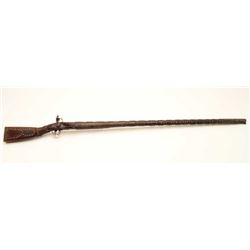 18AP-36 PERIOD MUSKETPeriod leather wrapped and tacked flintlock  trade musket, approximately .80 ca