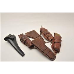 18AP-95 HOLSTER LOTBonanza lot of Western leather of varying  age, approximately 26 holsters, 6 hols