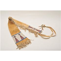 11AP-94 BEADED RIFLE CASEBeaded Indian tanned buckskin rifle case with  fringe and dangles; approxim