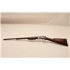 Image 1 : 17KH-554 COLT 22 #3514Colt Lightning pump action rifle, .22  caliber, blued finish, wood stocks, S/N