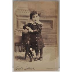 18EMY-24 MISC LOTLot of 2 early Cabinet photos, each of a  child; 1 holding a rifle and indentified 