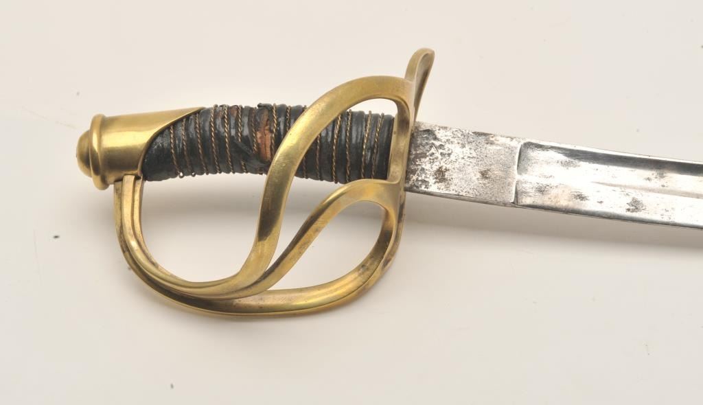 18AR6 D GUARD SWORDEtched blade brass “D” guard sword (no scabbard