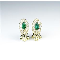 18CAI-27 EMERALD & DIAMOND EARRINGSDazzling earrings with two matching Emeralds  and 64 baguette and
