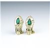 Image 2 : 18CAI-27 EMERALD & DIAMOND EARRINGSDazzling earrings with two matching Emeralds  and 64 baguette and