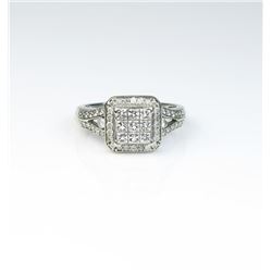 18CAI-43 DIAMOND RINGDazzling ring invisible set with six princess  cut Diamonds and 46 round Diamon