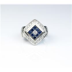 18CAI-44 SAPPHIRE & DIAMOND RINGStriking ring featuring a combination of Fine  princess cut Sapphire