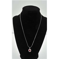 18PRS-3 RUBY & DIAMOND PENDANTOne fine quality ruby diamond 18k white gold  pendant with oval ruby w
