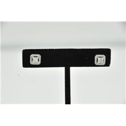 18PRS-5 DIAMOND EARRINGSOne pair of earrings set with princess cut  diamonds framed by round diamond
