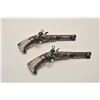 Image 1 : EVE-80 PAIR OF MIQUELET PISTOLSSuperb pair of ornately silver mounted  miquelet pistols in Spanish R
