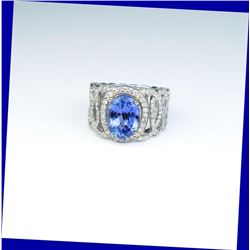 18CAI-17 TANZANITE & DIAMOND RINGGorgeous contemporary ring featuring a Fine  Tanzanite weighing 3.2