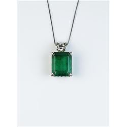 18CAI-28 EMERALD & DIAMOND PENDANTElegant pendant featuring a 7.44 carat green  Emerald and round Di