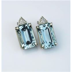 18CAI-29 AQUAMARINE & DIAMOND EARRINGSExquisite earrings featuring two matching  Aquamarines weighin